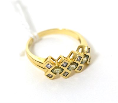 Lot 407 - A 9ct gold multi-coloured sapphire ring