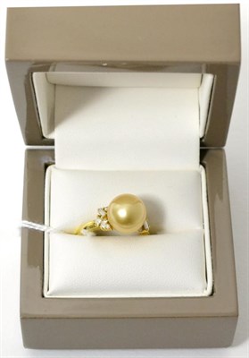 Lot 408 - An 18ct gold cultured pearl and diamond ring