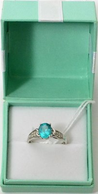 Lot 410 - A 9ct white gold apatite and diamond ring