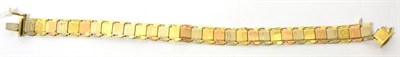 Lot 429 - An 18ct three colour gold bracelet