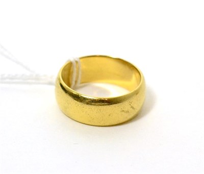 Lot 431 - An 18ct gold band ring, finger size R1/2