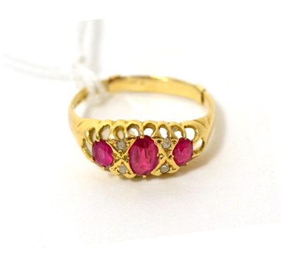 Lot 435 - An 18ct gold ruby and diamond ring