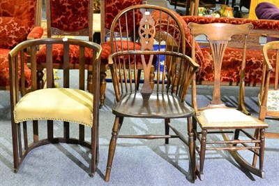 Lot 1058 - An oak Windsor chair, rocking chair and a tub chair (3)