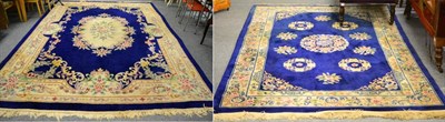 Lot 1062 - A Chinese carpet, Savonnerie design, the royal blue field centre by a floral medallion enclosed...