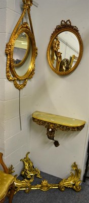 Lot 1073 - Three reproduction gilt framed mirrors, a reproduction wall mounted console table with an onyx...