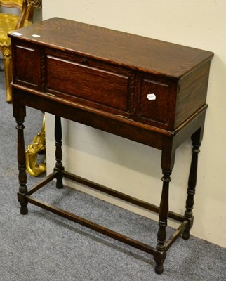 Lot 1074 - A 1920's oak cased radio 'Indigraph' together with a painted overmantle mirror