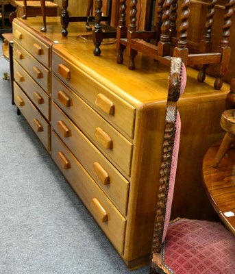 Lot 1083 - A pair of 1950's four height chests of drawers