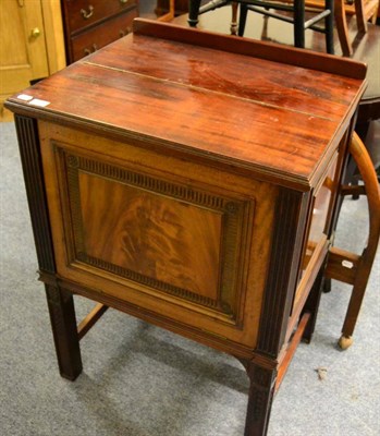 Lot 1085 - A mahogany drinks cabinet with hinged top and fall front