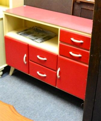 Lot 1089 - A 1950's kitchen cabinet, red and cream painted