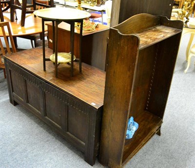 Lot 1104 - An 18th century oak coffer with replacement top, an oak bookcase and a Middle Eastern brass top...