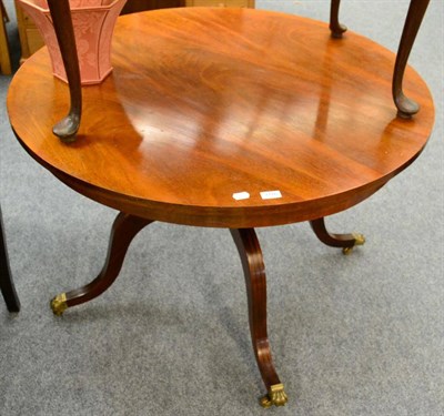 Lot 1116 - A reproduction mahogany centre table in the Regency style