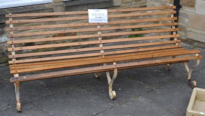 Lot 1125 - A Regency style metal garden bench with wooden slats