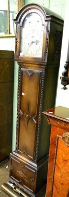 Lot 1227 - An early 20th century chiming longcase clock, arched silvered brass dial with two subsidiary...