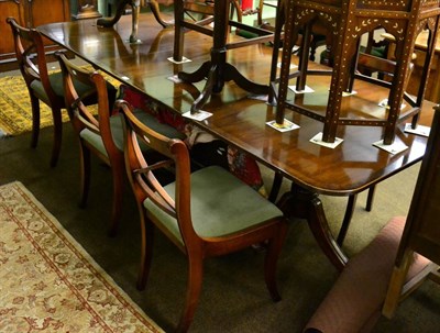 Lot 1237 - A dining table with six chairs and one other