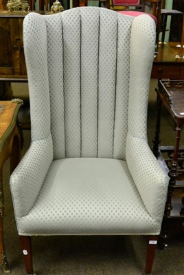 Lot 1262 - A George III high back wing chair