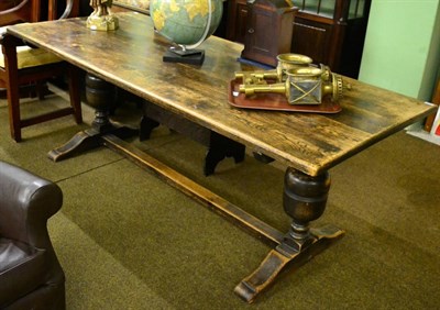 Lot 1273 - An oak refectory table