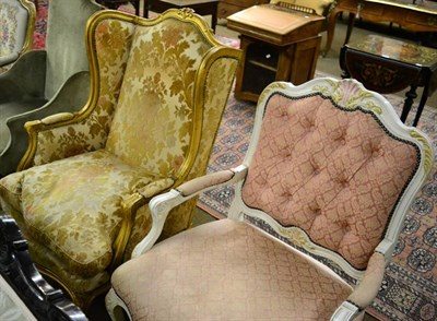 Lot 1285 - A reproduction cream painted part upholstered open armchair in the French taste together with a...