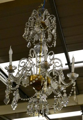 Lot 1290 - A large glass six branch chandelier