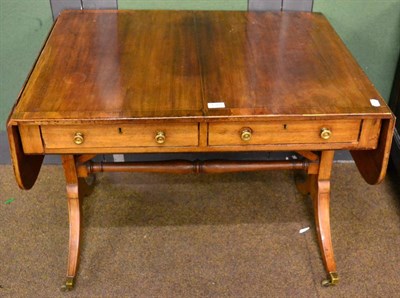 Lot 1303 - A George III mahogany and cross banded sofa table (a.f.)