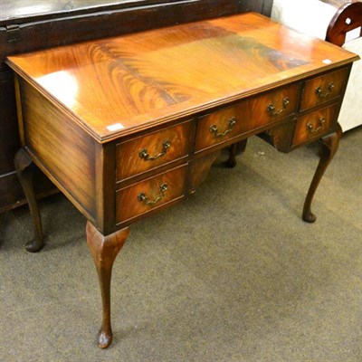 Lot 1313 - A mahogany writing desk