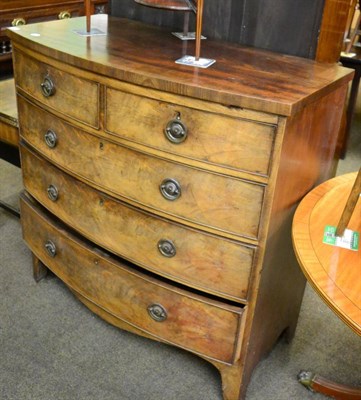 Lot 1319 - A George III mahogany bow fronted four height chest of drawers