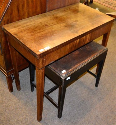 Lot 1321 - A George III mahogany fold over tea table