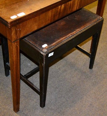 Lot 1322 - A George III oak stool joined by a H stretcher