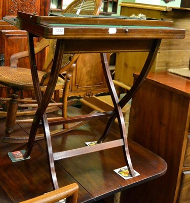 Lot 1332 - An Edwardian mahogany folding games table