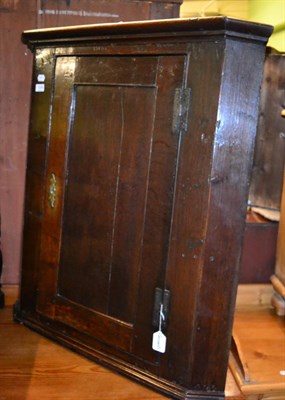 Lot 1338 - An 18th century provincial oak hanging corner cupboard