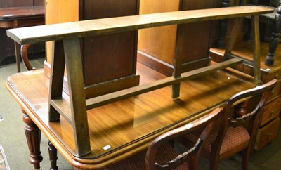 Lot 1341 - A 19th century French form/bench on trestle base