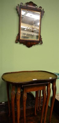 Lot 1345 - A mahogany fret work mirror together with a nest of walnut occasional tables