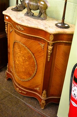 Lot 1370 - A reproduction French marble top serpentine fronted cabinet