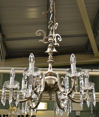 Lot 1377 - A reproduction silvered six light lustre drop chandelier