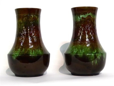 Lot 3 - Christopher Dresser for Linthorpe Pottery: Two Vases, shape No.60, decorated with a repeating...