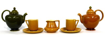 Lot 19 - Christopher Dresser for Linthorpe Pottery: A Teapot, shape No.662, mustard glaze, impressed...