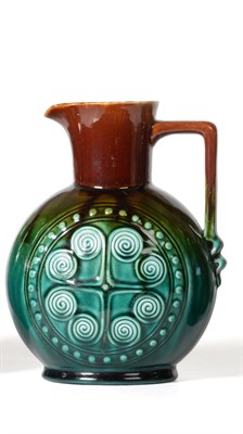 Lot 22 - Christopher Dresser for Linthorpe Pottery: A Jug, shape No.805, moulded with a repeating designs to