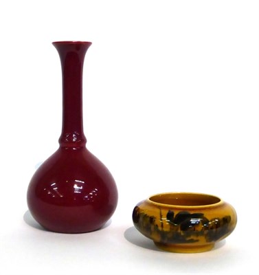 Lot 25 - Christopher Dresser for Linthorpe Pottery: A Vase, shape No. 846, maroon glaze, impressed LINTHORPE