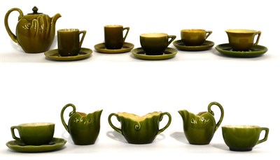 Lot 29 - A Linthorpe Pottery Tea Pot, shape No.1246, olive glaze, 14cm; and A Group of Linthorpe Pottery Tea