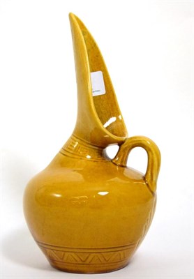 Lot 46 - Christopher Dresser for Linthorpe Pottery: A Jug, shape No.346, moulded with repeating designs,...