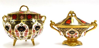 Lot 55 - A Royal Crown Derby Old Imari swing handled biscuit jar and cover, raised on three legs,...