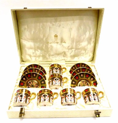 Lot 68 - A set of six cased Royal Crown Derby Imari coffee cans and saucers, all pattern number 1128