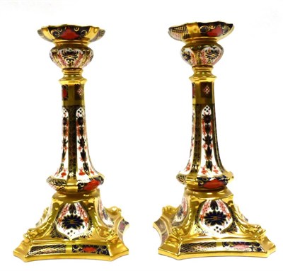 Lot 72 - A pair of Royal Crown Derby Imari candlesticks, pattern number 1128