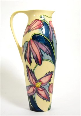 Lot 98 - A modern Moorcroft Wyevale pattern jug, designed by Philip Gibson, 27cm (boxed)