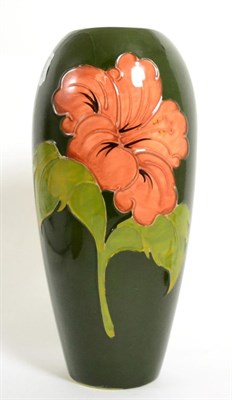 Lot 105 - A Walter Moorcroft Coral Hibiscus pattern vase, 31cm