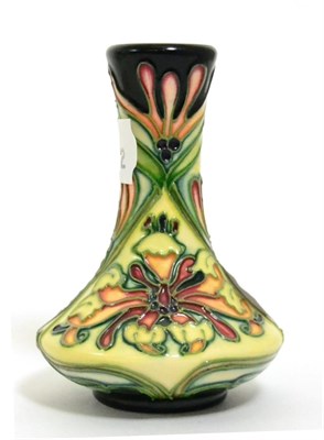 Lot 106 - A modern Moorcroft Florian Dream pattern vase, designed by Rachel Bishop, 10cm (boxed)