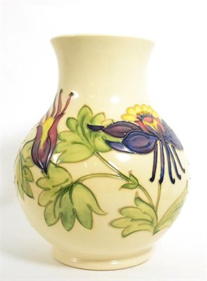 Lot 107 - A Walter Moorcroft Columbine pattern vase, 24cm