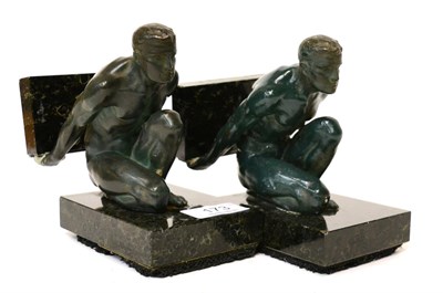 Lot 173 - A pair of Art Deco figural bookends with marble bases (a.f)