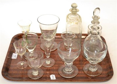 Lot 197 - A tray of Georgian and later glass, including triple ring neck decanter, cordials etc