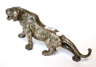 Lot 202 - A Japanese white metal tiger, 34cm in length