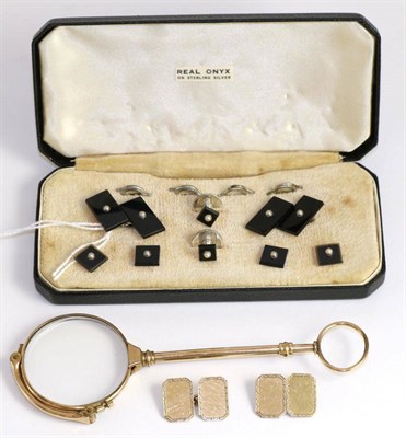 Lot 216 - A cased set of onyx and pearl dress studs, a lorgnette and a pair of cufflinks stamped '9ct'